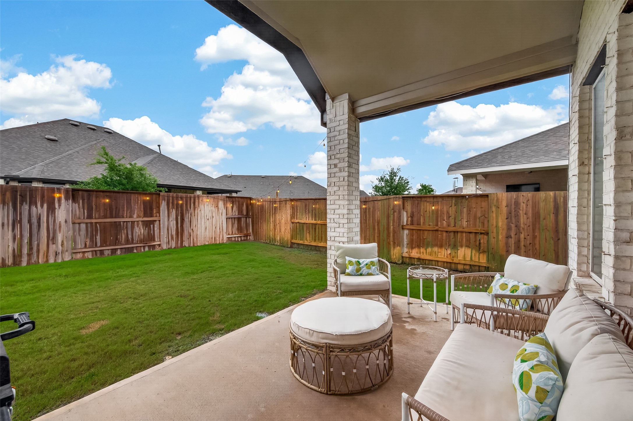 5019 Country Mdws Trail Rosharon, TX 77583 - Photo 40 of 49 a view of a patio with couches chairs and a yard