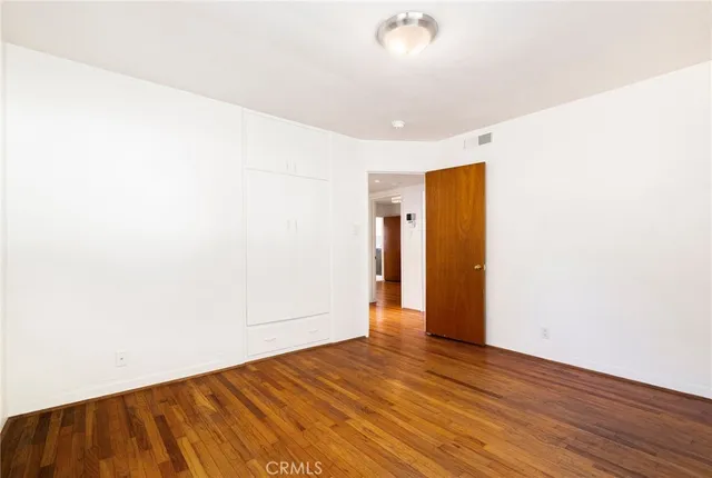 a front view of a house with a yard and a garage