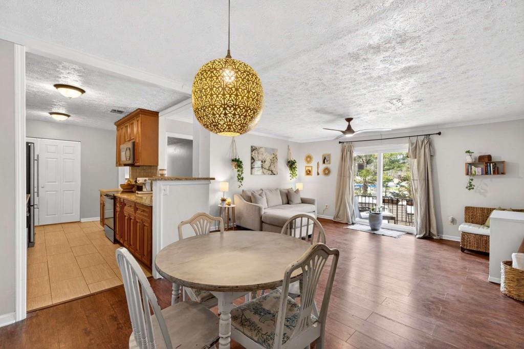 725 Dalrymple Road, Unit 5F Sandy Springs, GA 30328 - Photo 11 of 33 a view of a dining room with furniture
