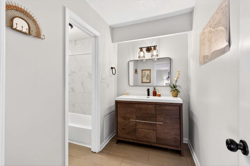 725 Dalrymple Road, Unit 5F Sandy Springs, GA 30328 - Photo 24 of 33 a room with cabinets and window