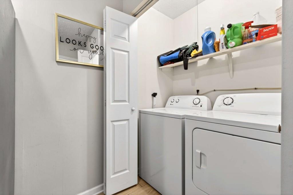 725 Dalrymple Road, Unit 5F Sandy Springs, GA 30328 - Photo 25 of 33 a utility room with dryer and washer