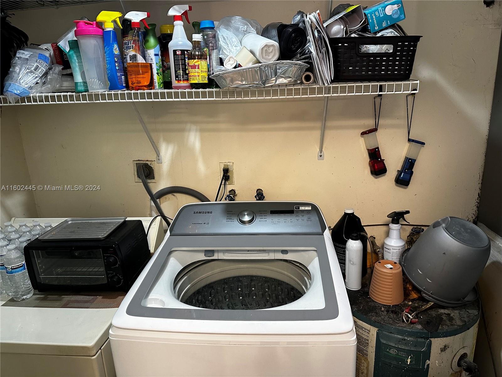 Westview Miami, FL 33167 - Photo 6 of 10 a utility room with dryer and washer
