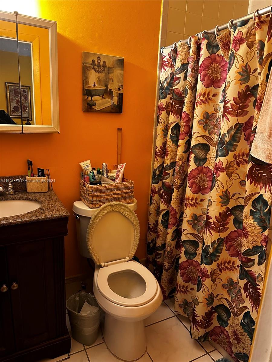 Westview Miami, FL 33167 - Photo 9 of 10 a bathroom with a toilet and a sink