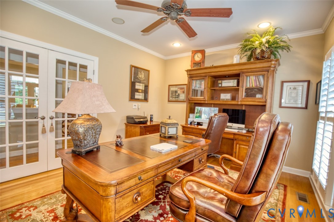 9960 Mill Pond Road Toano, VA 23168 - Photo 27 of 42 Hardwood flooring, crown molding, double French do