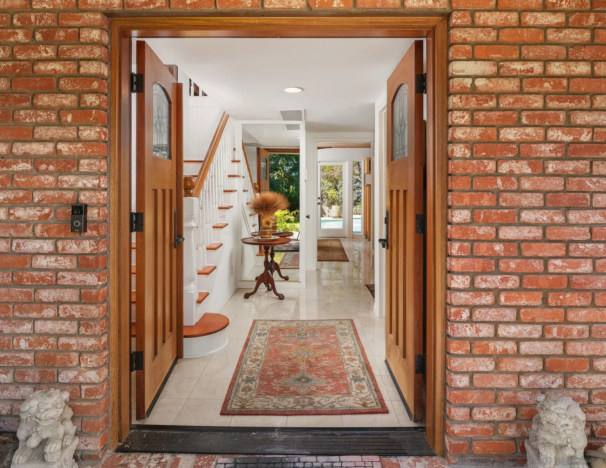 1669 Los Altos Road San Diego, CA 92109 - Photo 2 of 62 a view of a hallway with wooden floor and living room