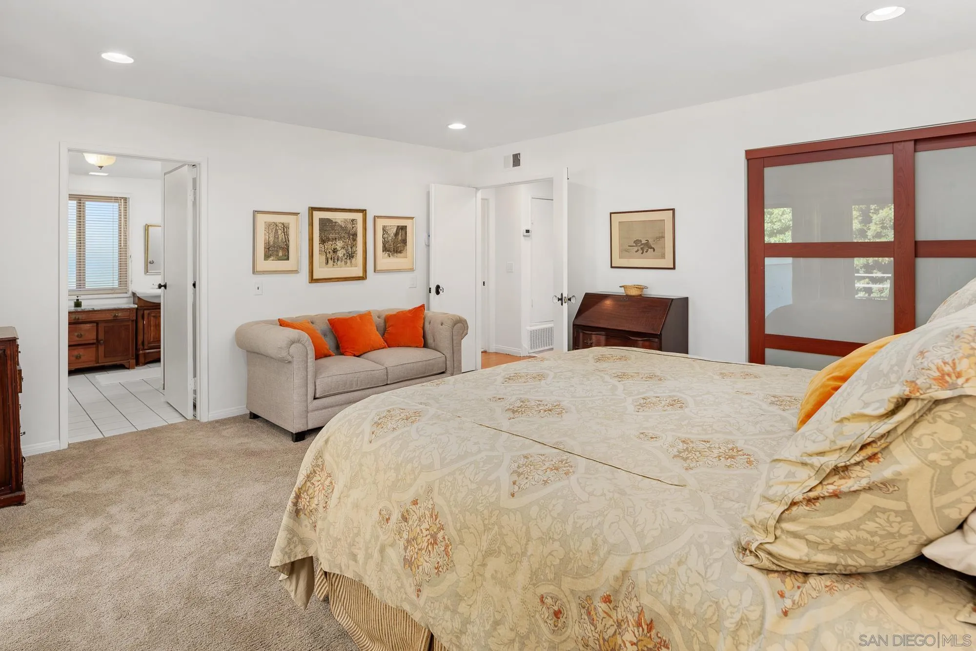 1669 Los Altos Road San Diego, CA 92109 - Photo 21 of 62 a bedroom with a large bed and a couch