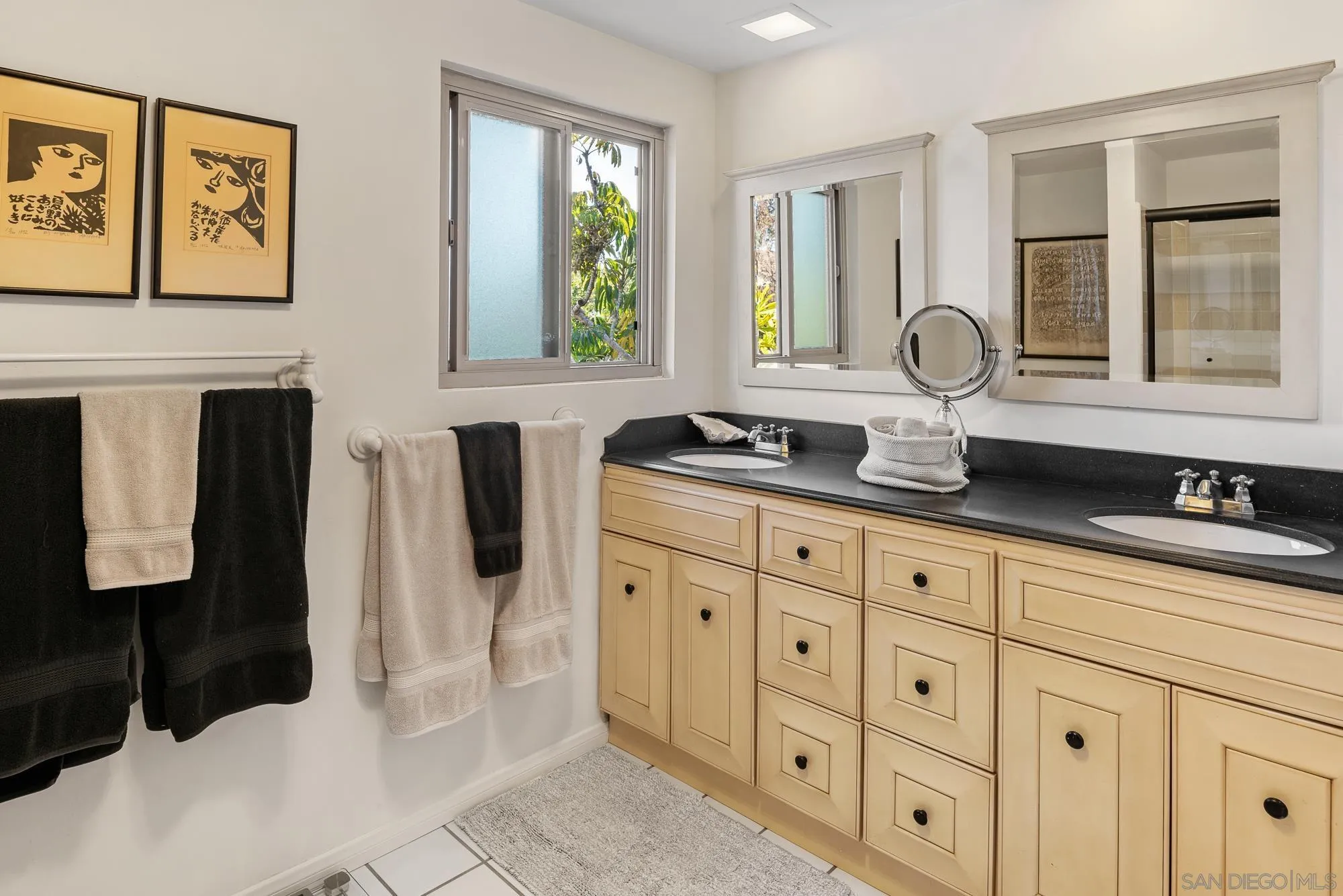 1669 Los Altos Road San Diego, CA 92109 - Photo 27 of 62 a close view of sink and mirror