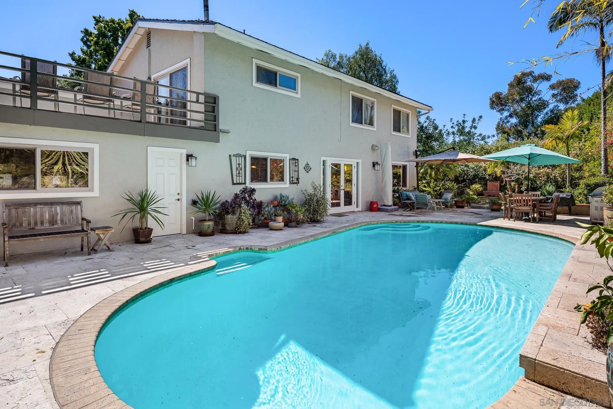 1669 Los Altos Road San Diego, CA 92109 - Photo 33 of 62 a view of a house with backyard porch and sitting area