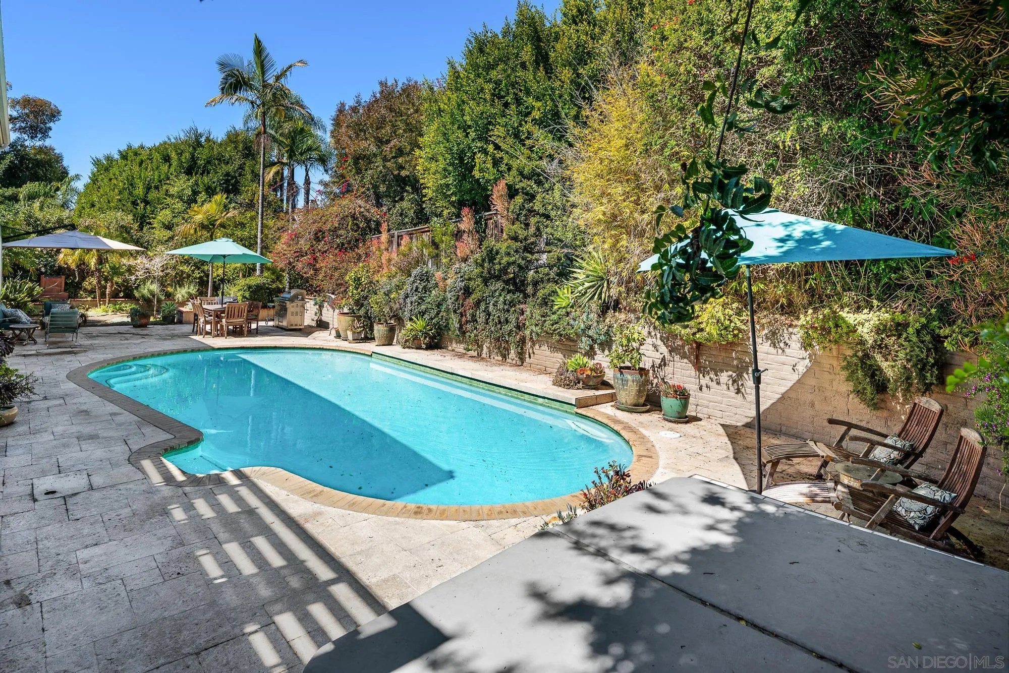 1669 Los Altos Road San Diego, CA 92109 - Photo 34 of 62 a view of a swimming pool with an outdoor seating