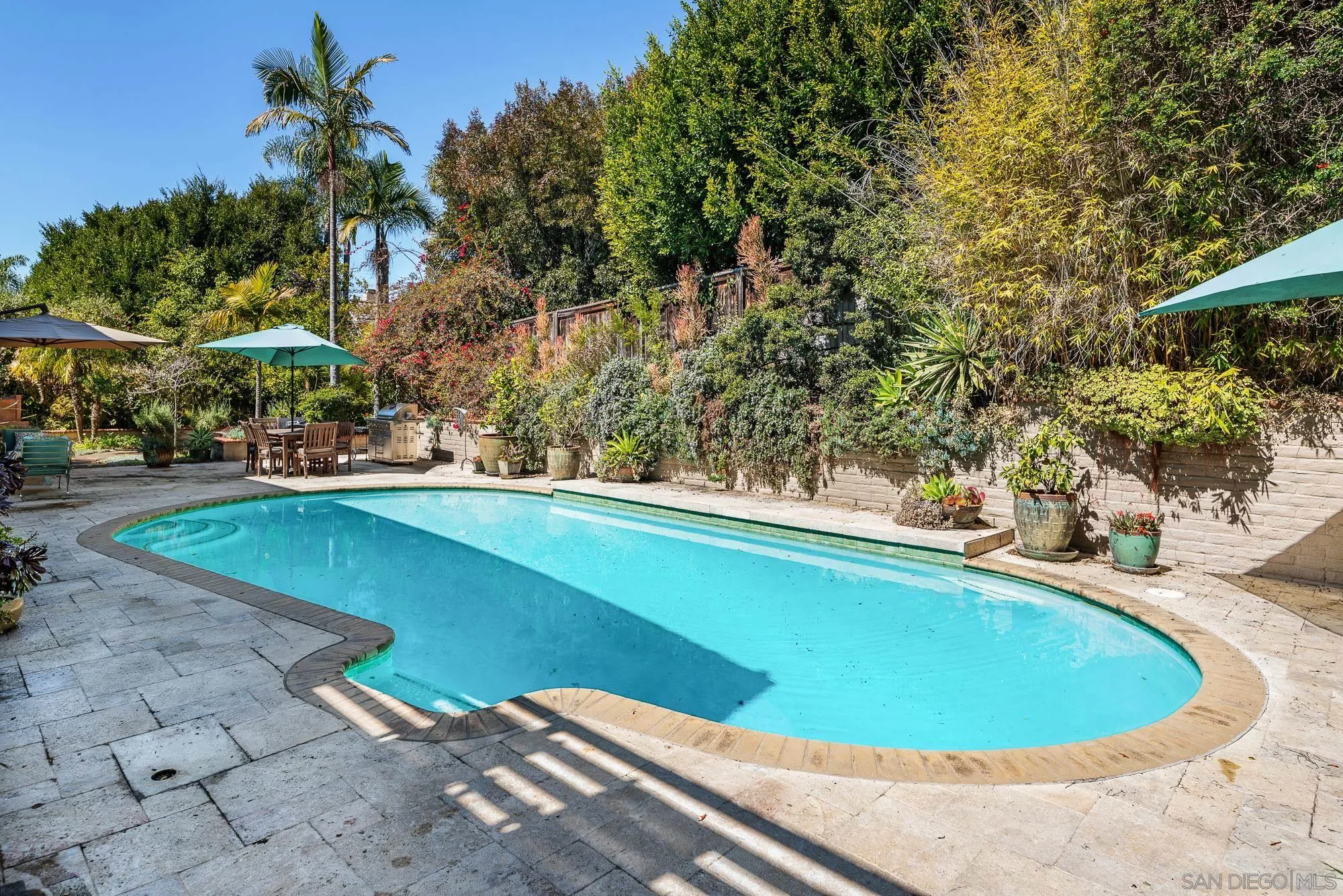 1669 Los Altos Road San Diego, CA 92109 - Photo 35 of 62 a view of a swimming pool with an outdoor space