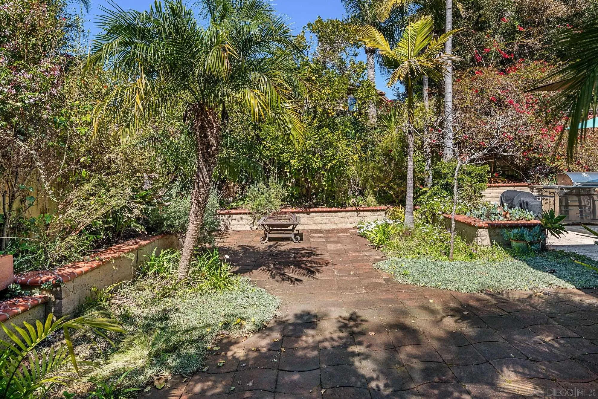 1669 Los Altos Road San Diego, CA 92109 - Photo 41 of 62 a view of backyard with green space