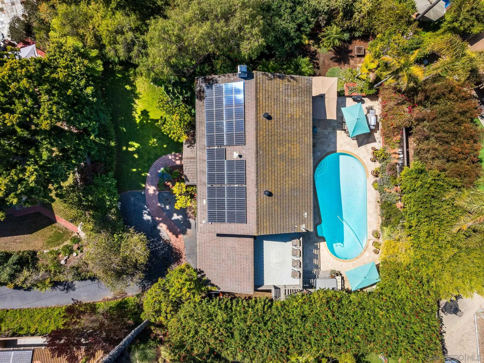 1669 Los Altos Road San Diego, CA 92109 - Photo 45 of 62 an aerial view of a house with a yard and trees