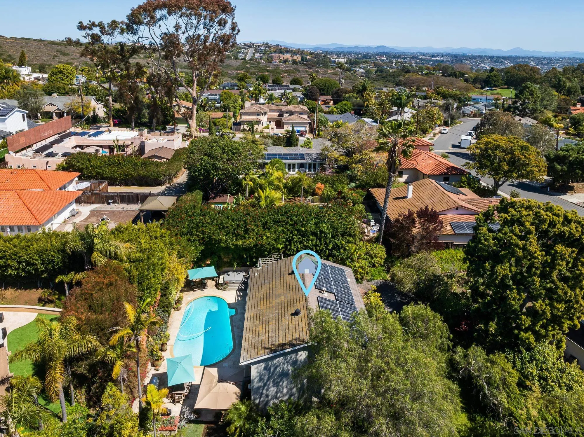 1669 Los Altos Road San Diego, CA 92109 - Photo 46 of 62 an aerial view of a house with a yard and lake view