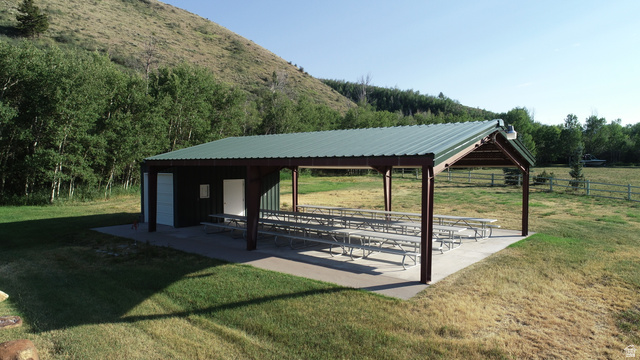 1133 Paris Canyon Road Paris, ID 83261 - Photo 5 of 75 Expansive covered pavilion featuring an enclosed building, substantial support beams, and a concrete slab foundation