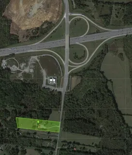 a view of a lake with a big yard