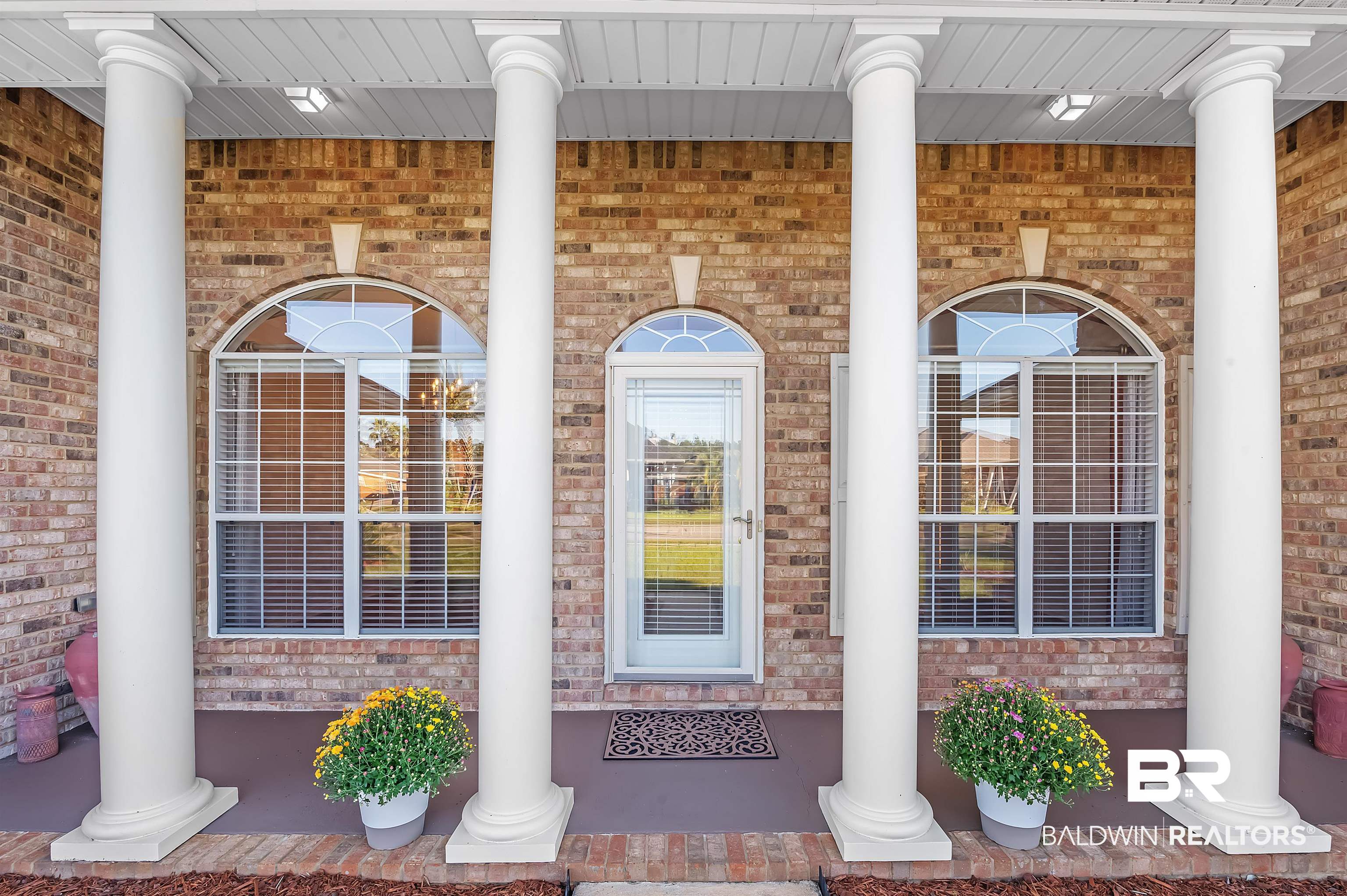 421 Collinwood Loop Foley, AL 36535 - Photo 5 of 62 View of exterior entry with covered porch