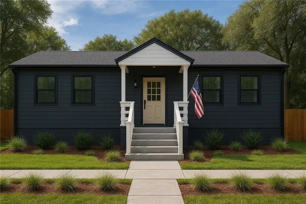 a front view of a house with garden