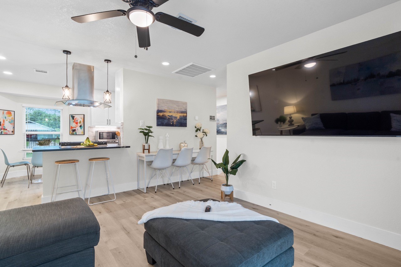 3138 Sunbeam Street Houston, TX 77051 - Photo 13 of 50 This thoughtfully designed open-concept layout creates the perfect flow for entertaining, blending cozy living spaces with sleek modern finishes.