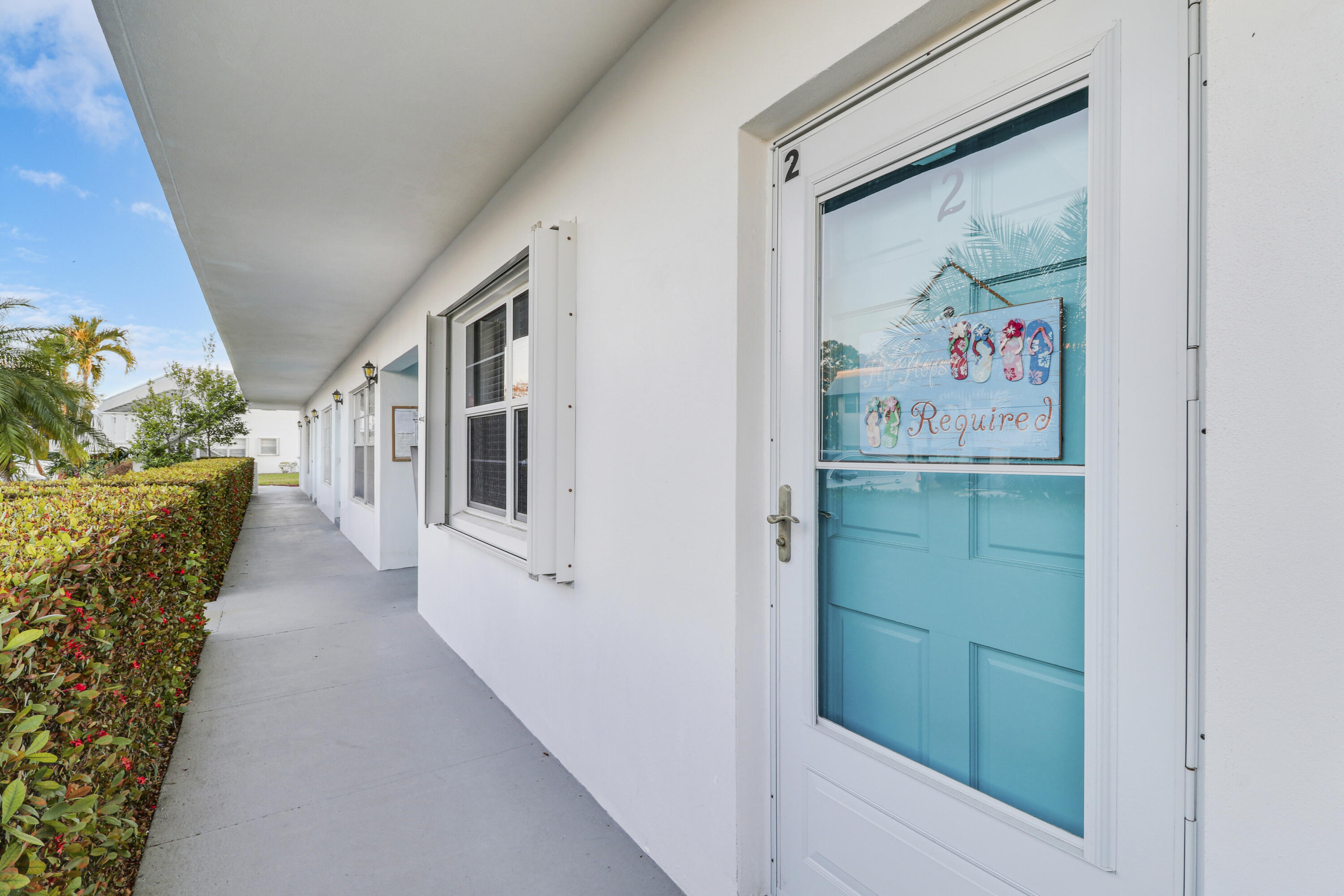 2929 Southeast Ocean Boulevard, Unit 1122 Stuart, FL 34996 - Photo 3 of 37 a view of hallway with stairs