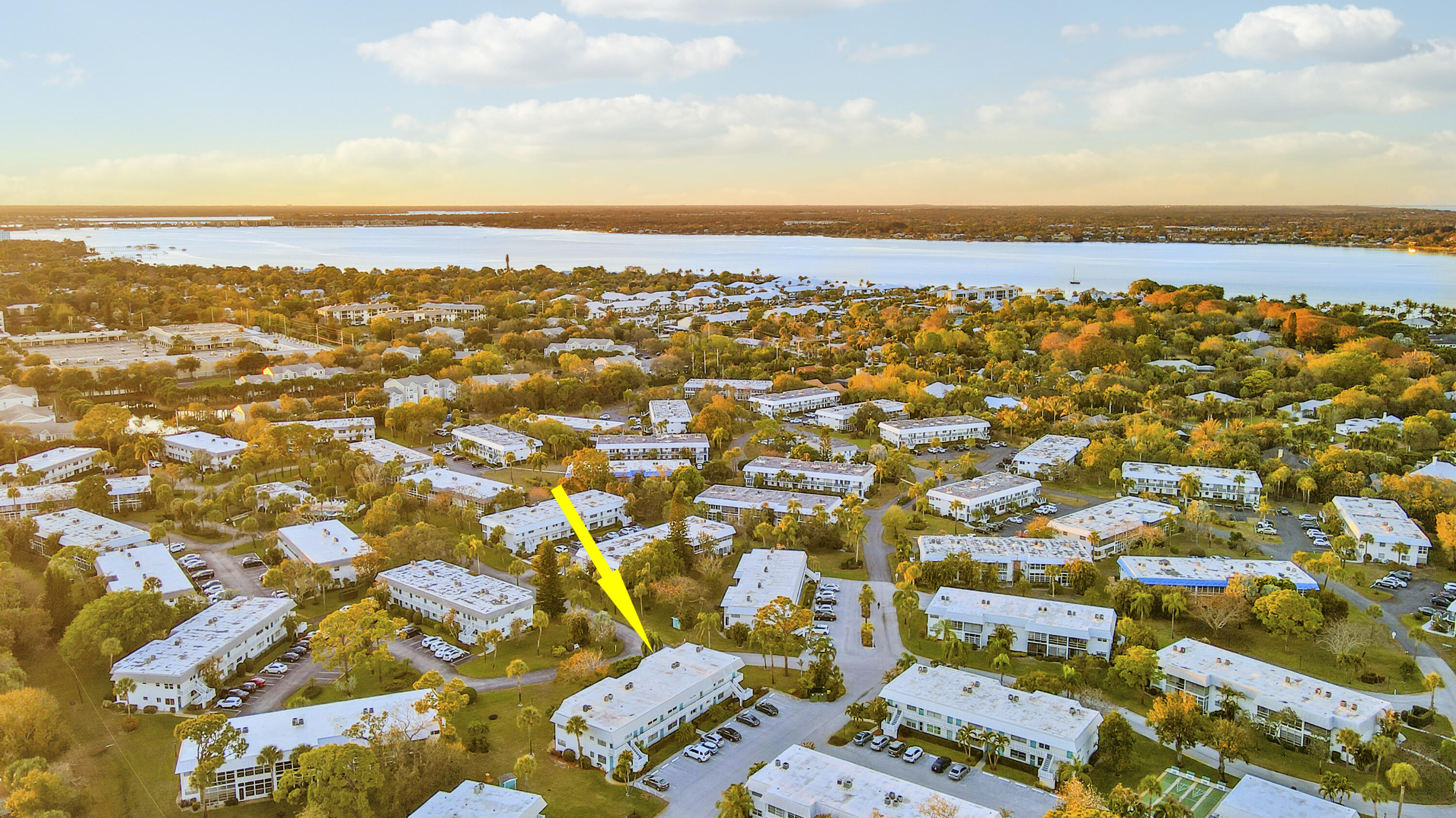 2929 Southeast Ocean Boulevard, Unit 1122 Stuart, FL 34996 - Photo 31 of 37 an aerial view of residential building with parking space