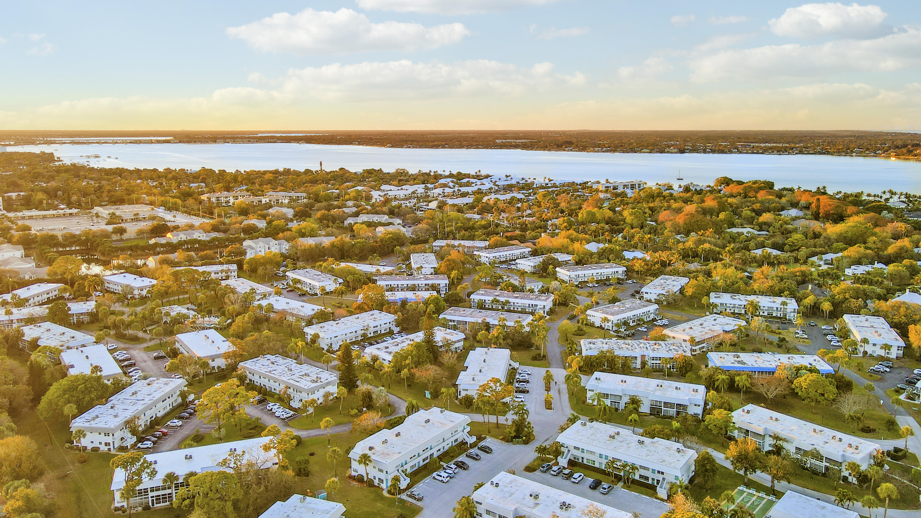 2929 Southeast Ocean Boulevard, Unit 1122 Stuart, FL 34996 - Photo 32 of 37 an aerial view of residential building with parking space
