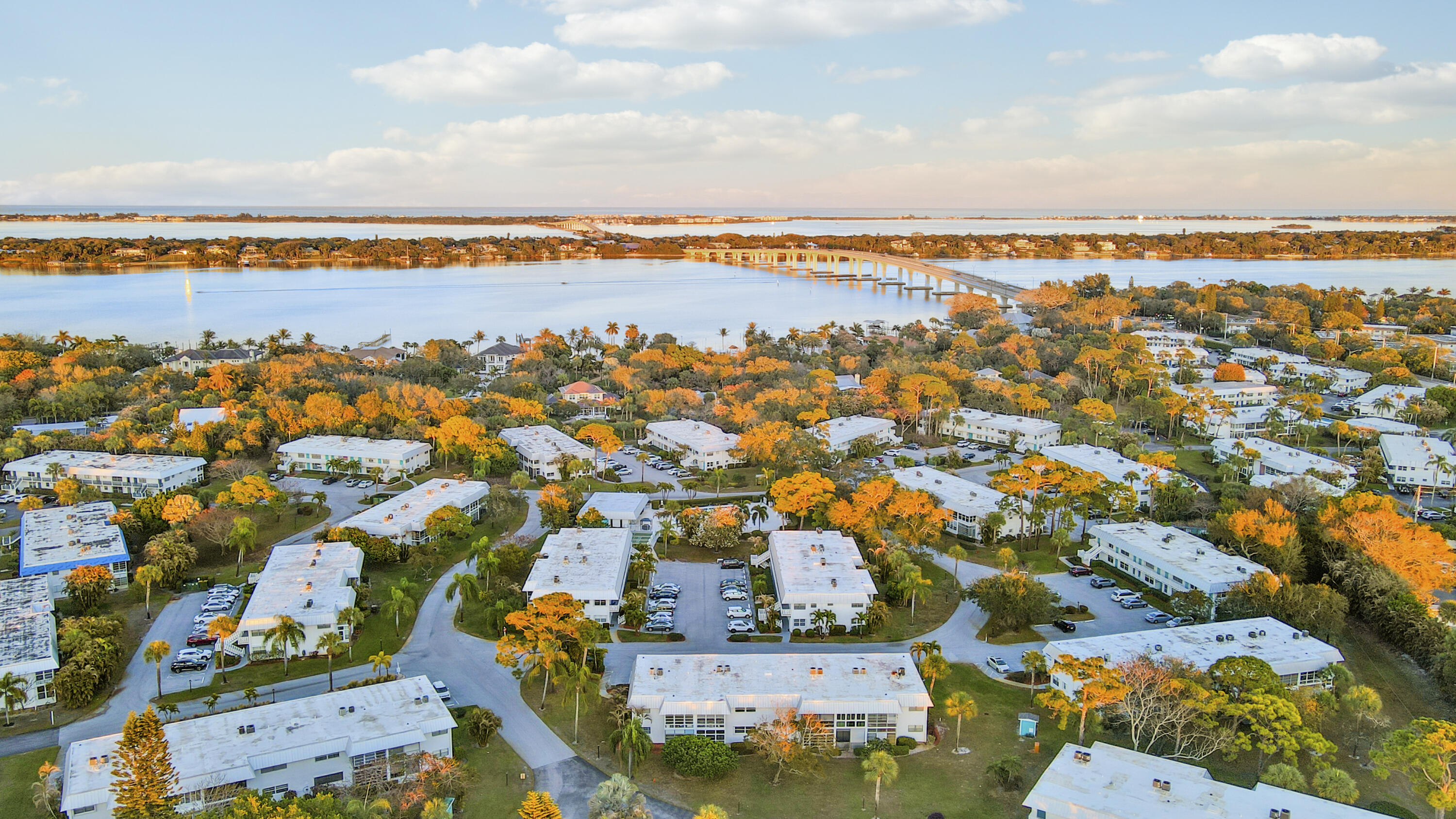 2929 Southeast Ocean Boulevard, Unit 1122 Stuart, FL 34996 - Photo 35 of 37 an aerial view of residential building and lake