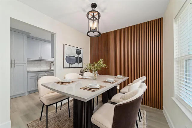 a view of a dining room with furniture