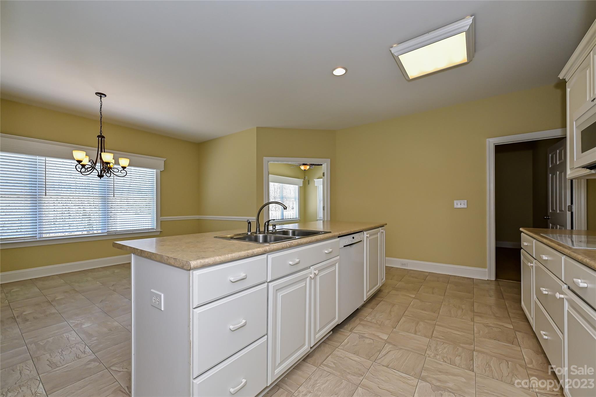 8834 Wingard Road Waxhaw, NC 28173 - Photo 13 of 46 a bathroom with a sink and a mirror