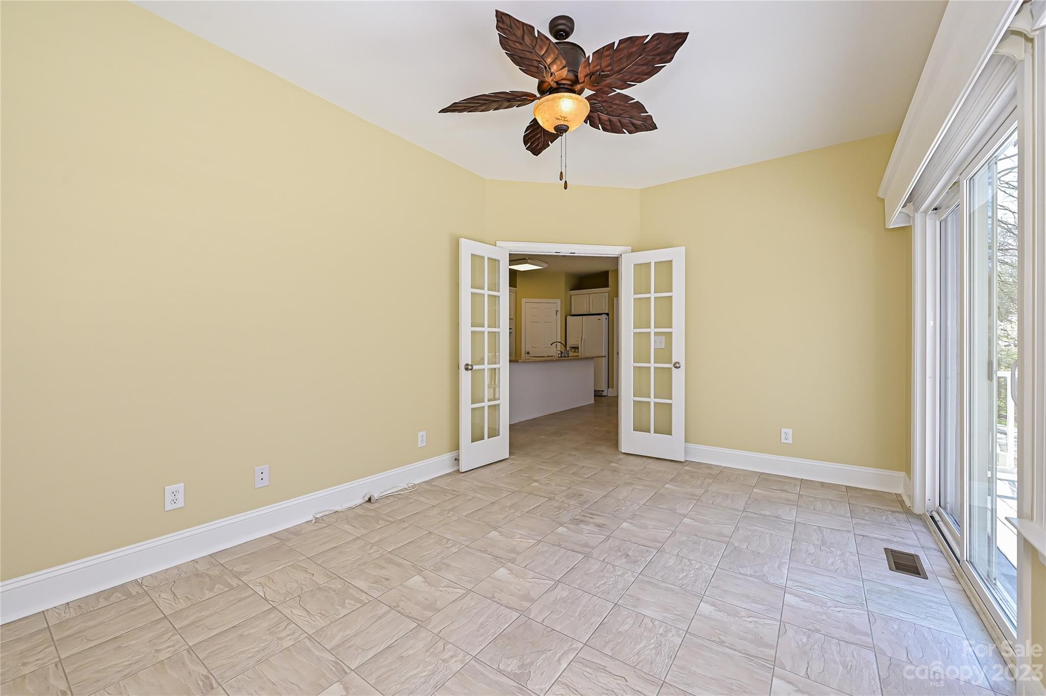 8834 Wingard Road Waxhaw, NC 28173 - Photo 17 of 46 an empty room with a ceiling fan and a window