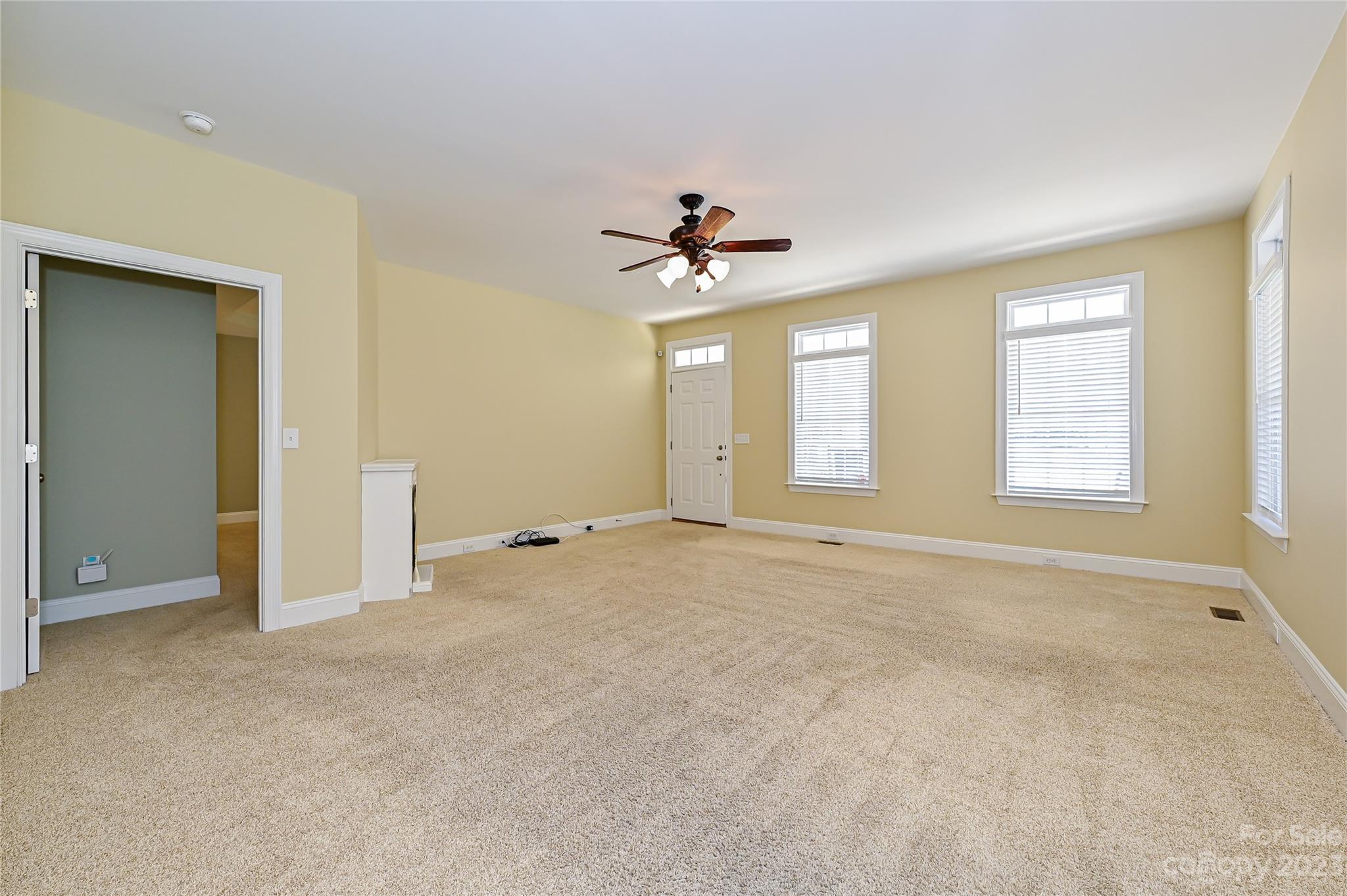 8834 Wingard Road Waxhaw, NC 28173 - Photo 21 of 46 a view of an empty room with a window