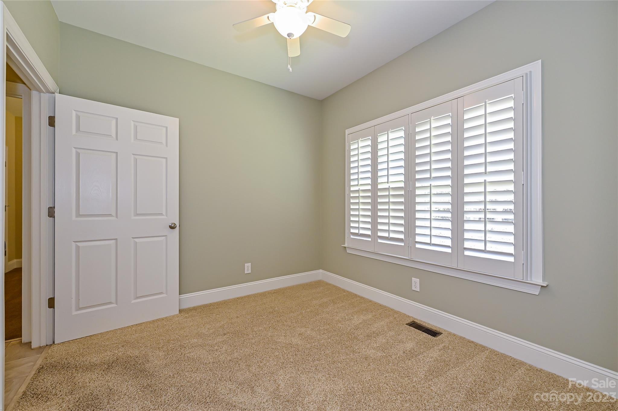 8834 Wingard Road Waxhaw, NC 28173 - Photo 27 of 46 a view of an empty room with a window