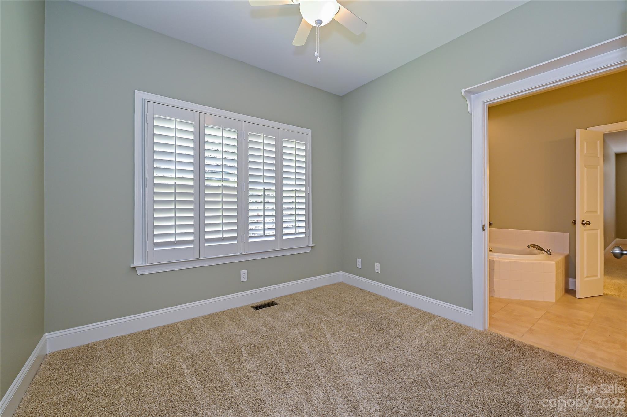 8834 Wingard Road Waxhaw, NC 28173 - Photo 28 of 46 a view of an empty room with a window