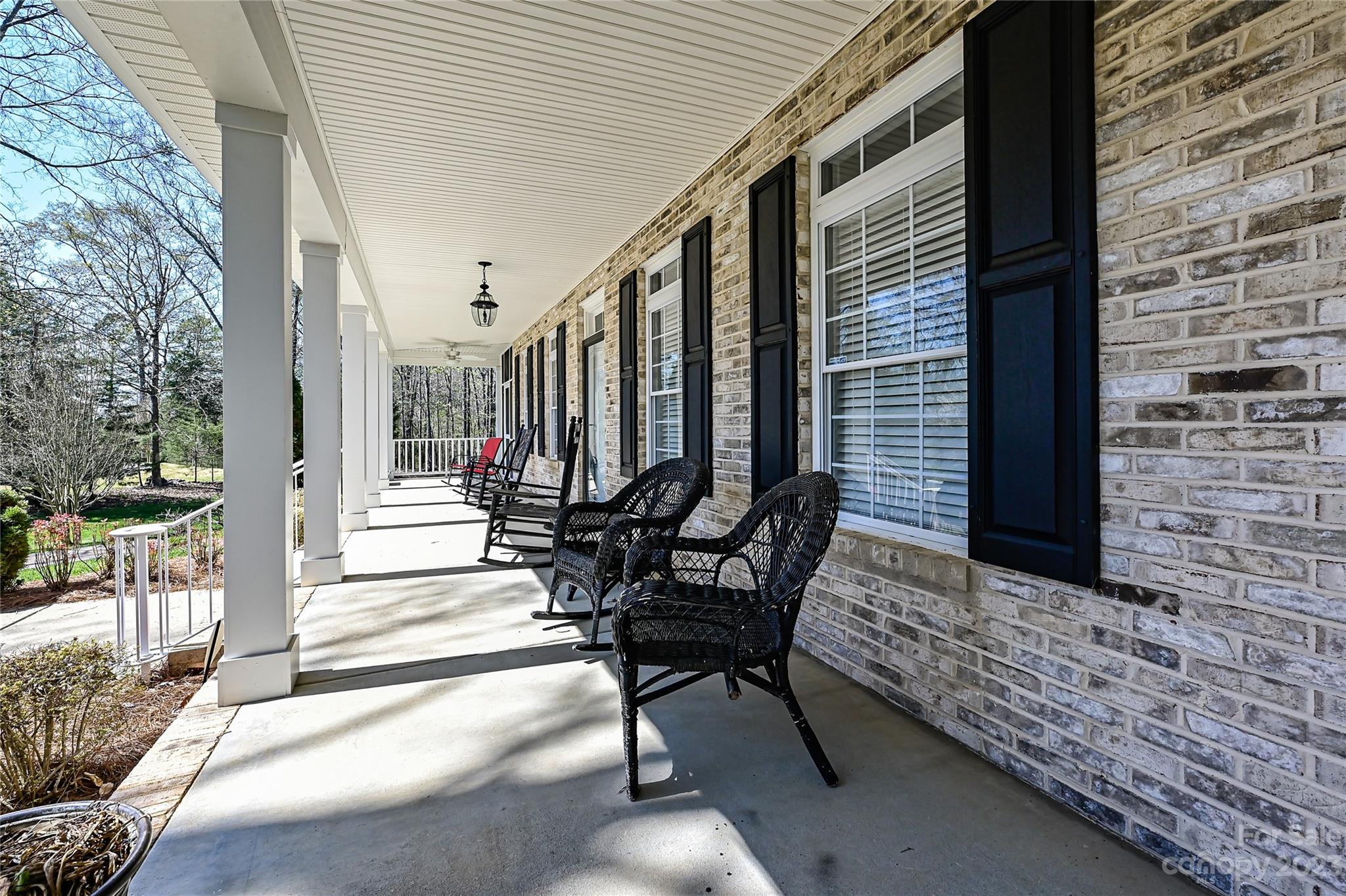 8834 Wingard Road Waxhaw, NC 28173 - Photo 3 of 46 a house view with outdoor seating space