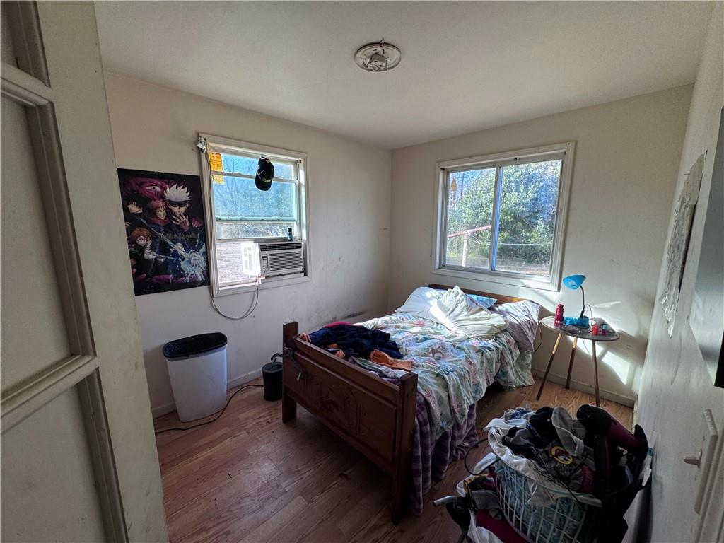 209 Denham Street Thomaston, GA 30286 - Photo 11 of 13 a bedroom with a bed and a window