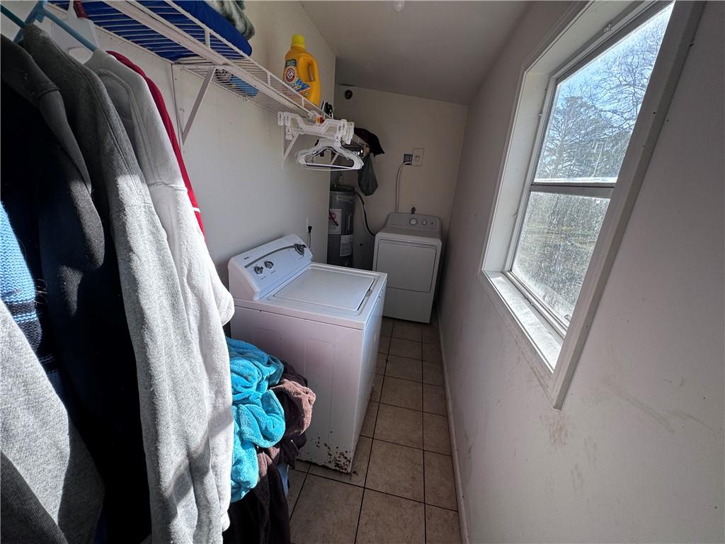 209 Denham Street Thomaston, GA 30286 - Photo 12 of 13 a utility room with dryer and washer
