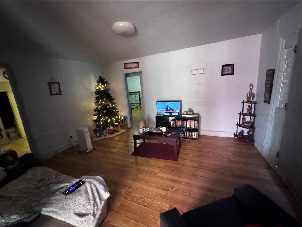 209 Denham Street Thomaston, GA 30286 - Photo 6 of 13 a living room with furniture and a potted plant