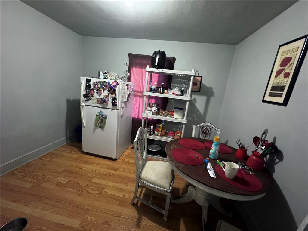 209 Denham Street Thomaston, GA 30286 - Photo 8 of 13 a room with furniture and book shelf