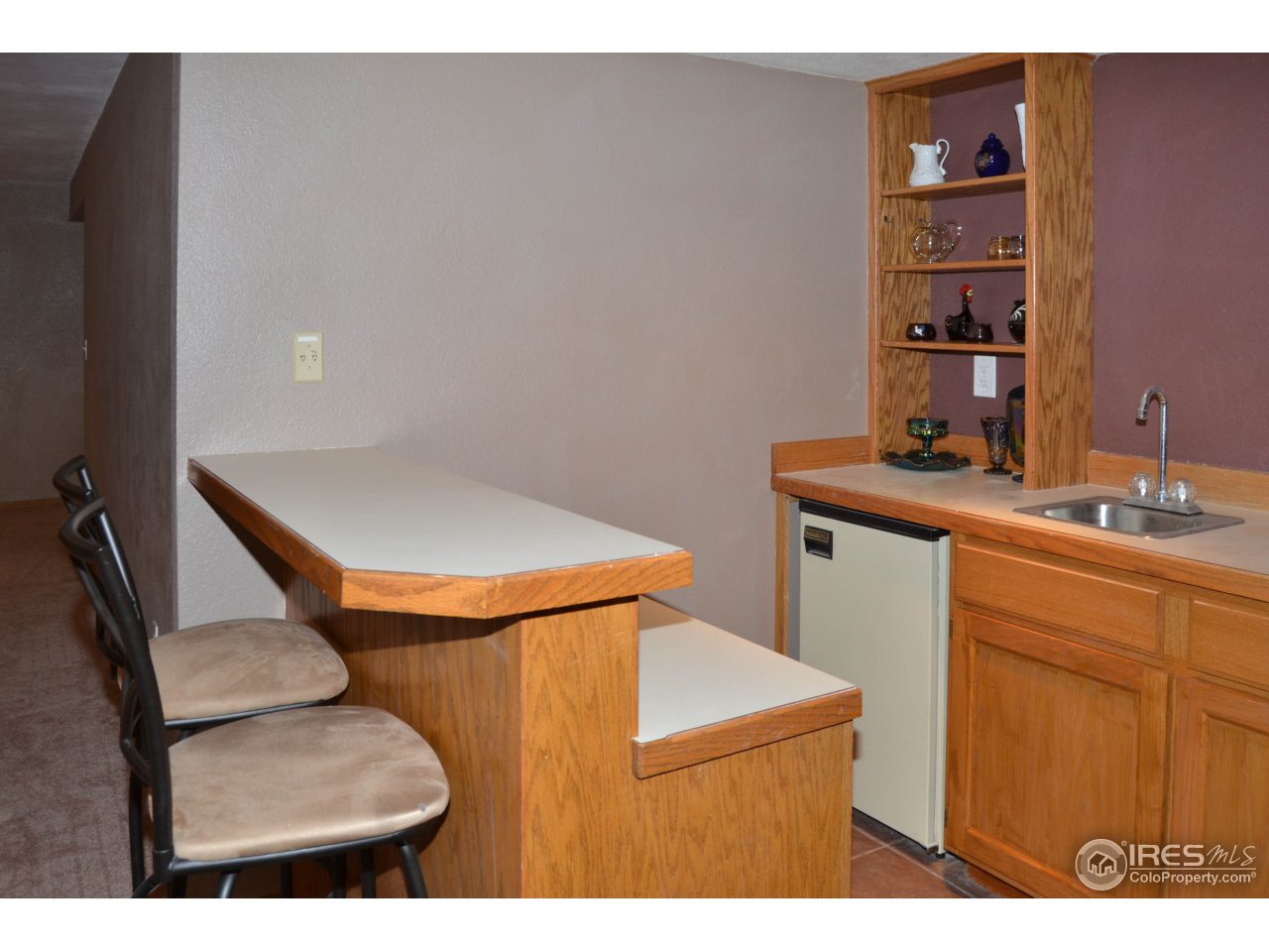 4839 West 6th Street Road Greeley, CO 80634 - Photo 16 of 23 Basement wet Bar with bar fridge included