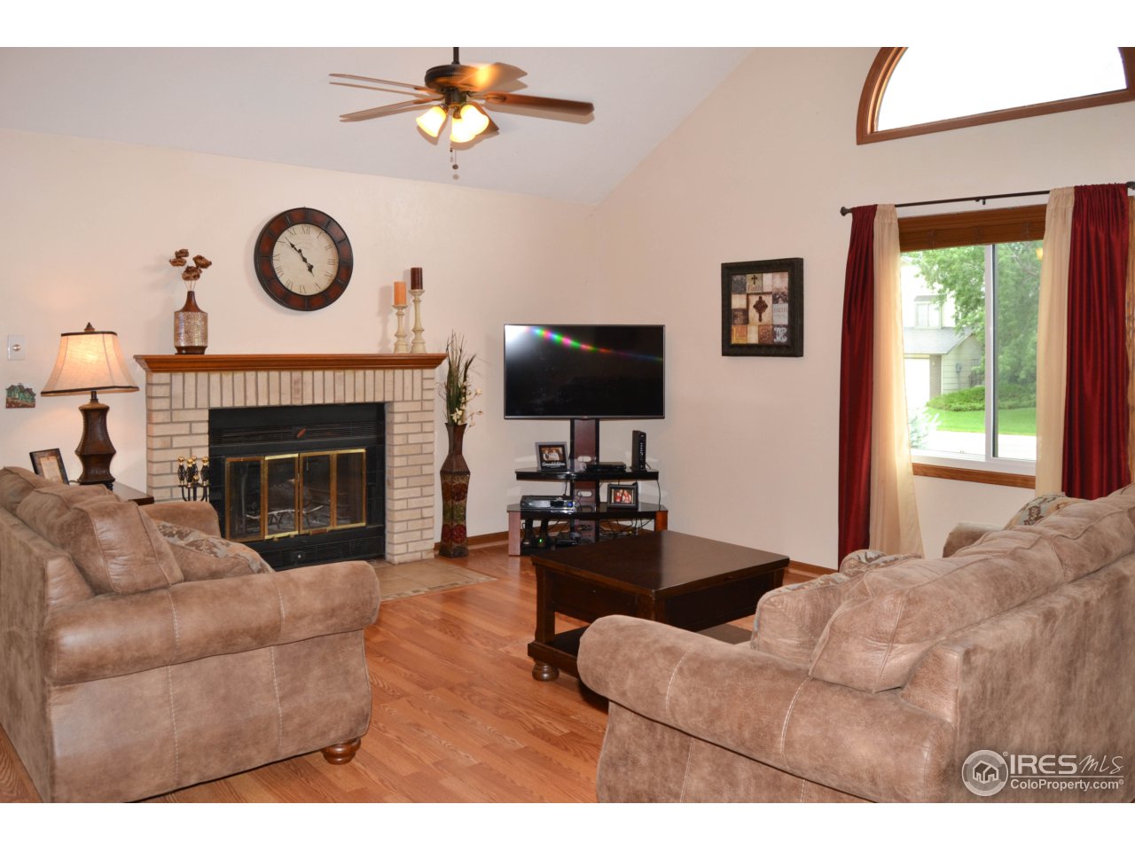 4839 West 6th Street Road Greeley, CO 80634 - Photo 2 of 23 a very inviting, open living room