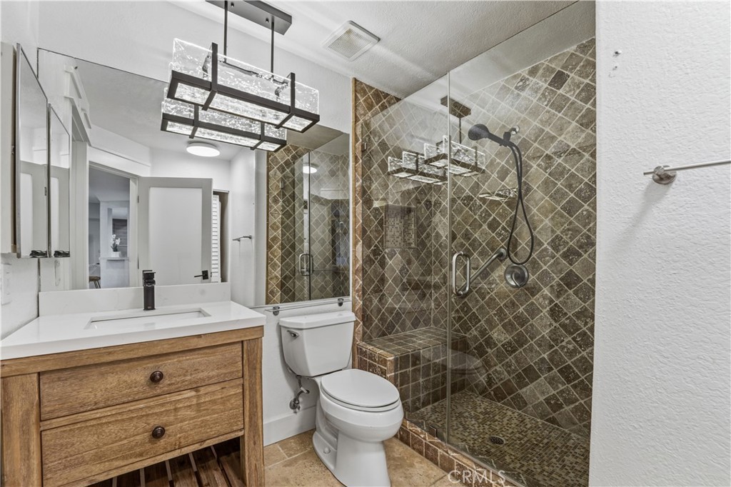 5 Baycrest Place Dana Point, CA 92629 - Photo 16 of 23 a bathroom with a sink toilet and shower
