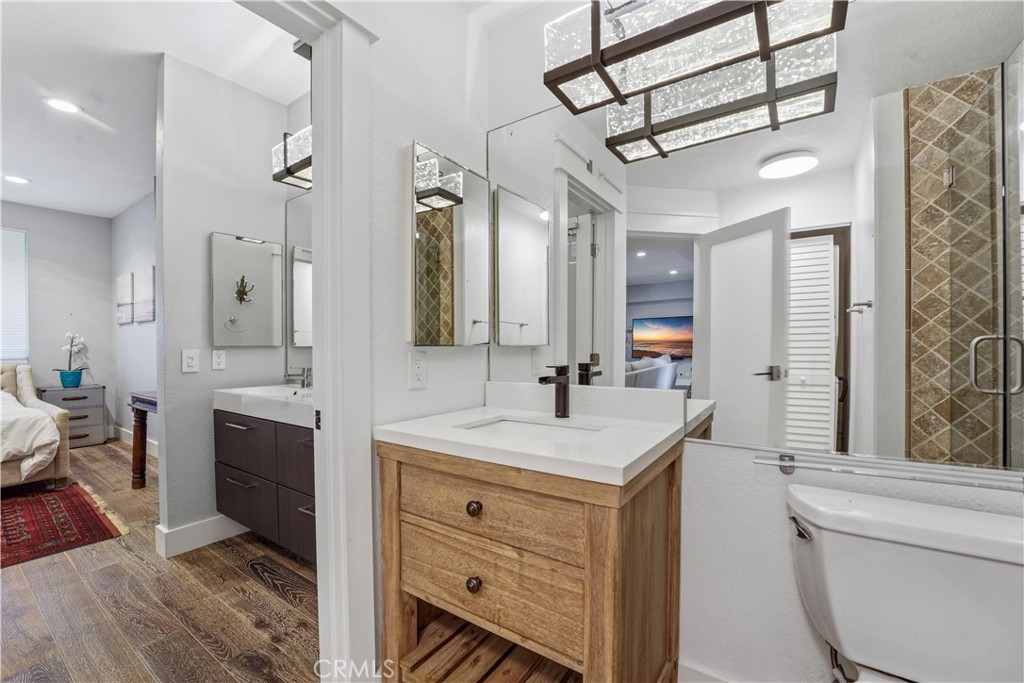 5 Baycrest Place Dana Point, CA 92629 - Photo 17 of 23 a spacious bathroom with a sink a toilet a mirror and shower