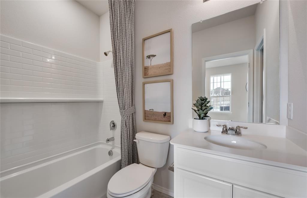 14053 Ladbroke Street Pilot Point, TX 76258 - Photo 17 of 19 Spacious secondary bathroom