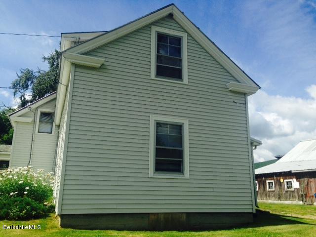 625 Middle Road Clarksburg, MA 01247 - Photo 3 of 6 a front view of a house with a yard