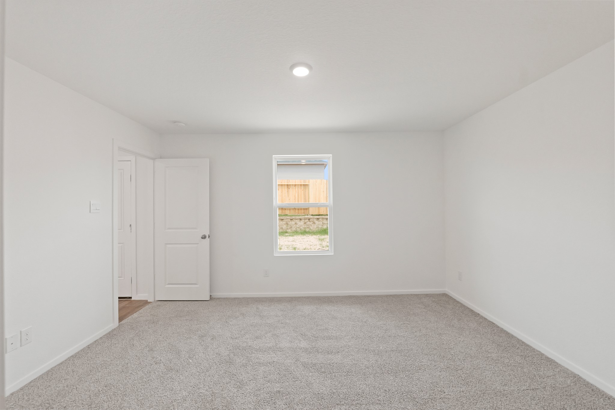 22710 Ravine Edge Court Hockley, TX 77447 - Photo 16 of 23 an empty room with a window