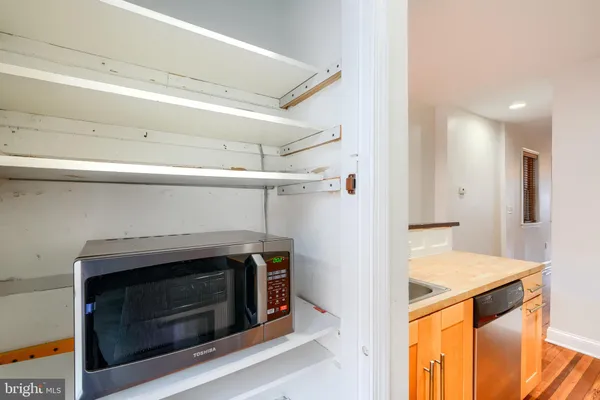 a view of kitchen and utility room