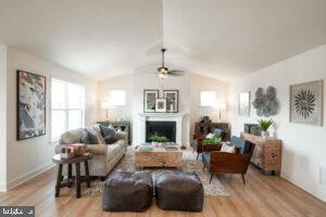 0 Old Orch Road, Unit LAUREL Strasburg, PA 17579 - Photo 4 of 15 a living room with furniture fireplace and a large window