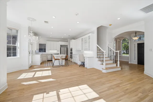 a view of a living room and entry way