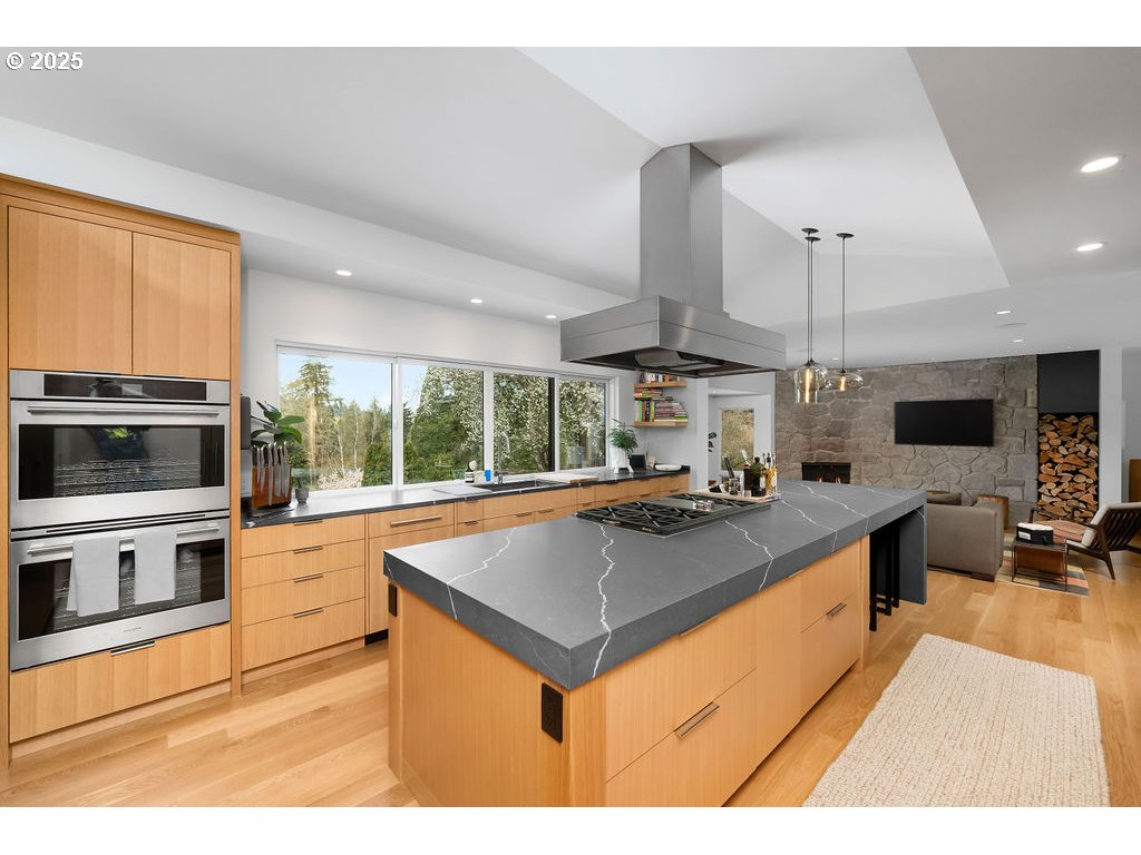 2627 Park Road Lake Oswego, OR 97034 - Photo 14 of 47 a kitchen with stainless steel appliances granite countertop a stove and a sink