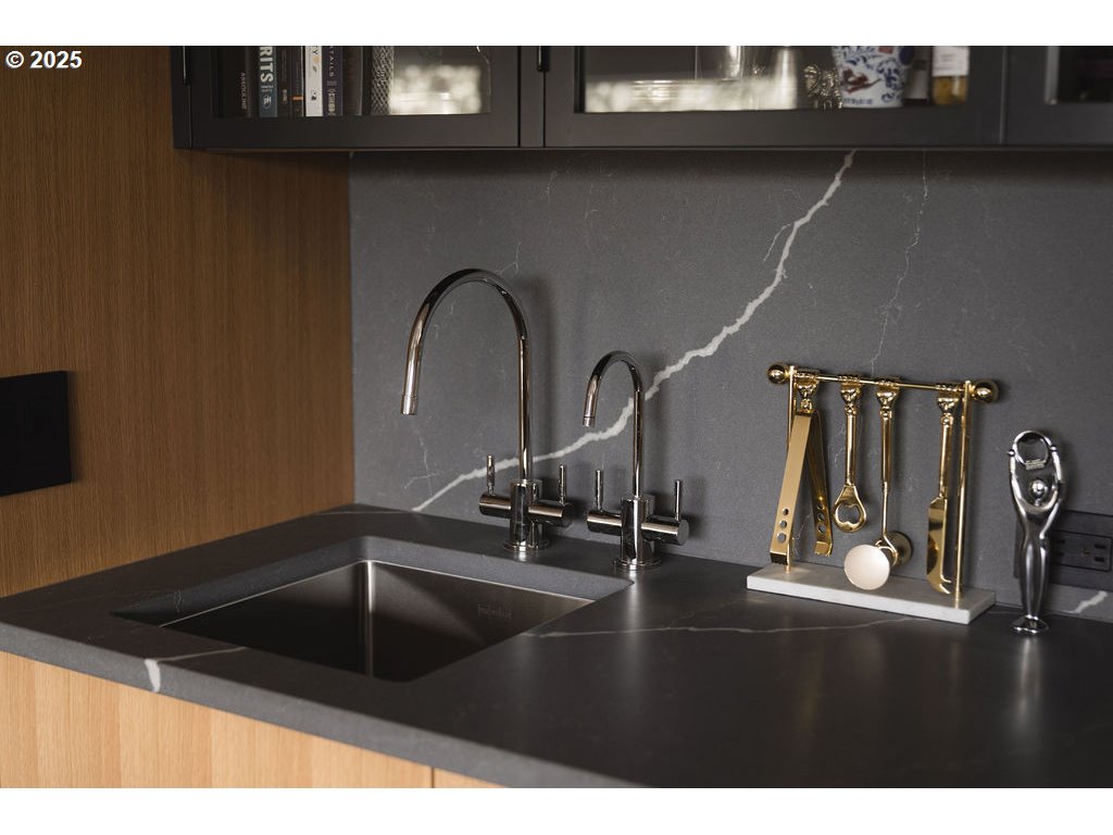 2627 Park Road Lake Oswego, OR 97034 - Photo 16 of 47 a kitchen with a sink and granite