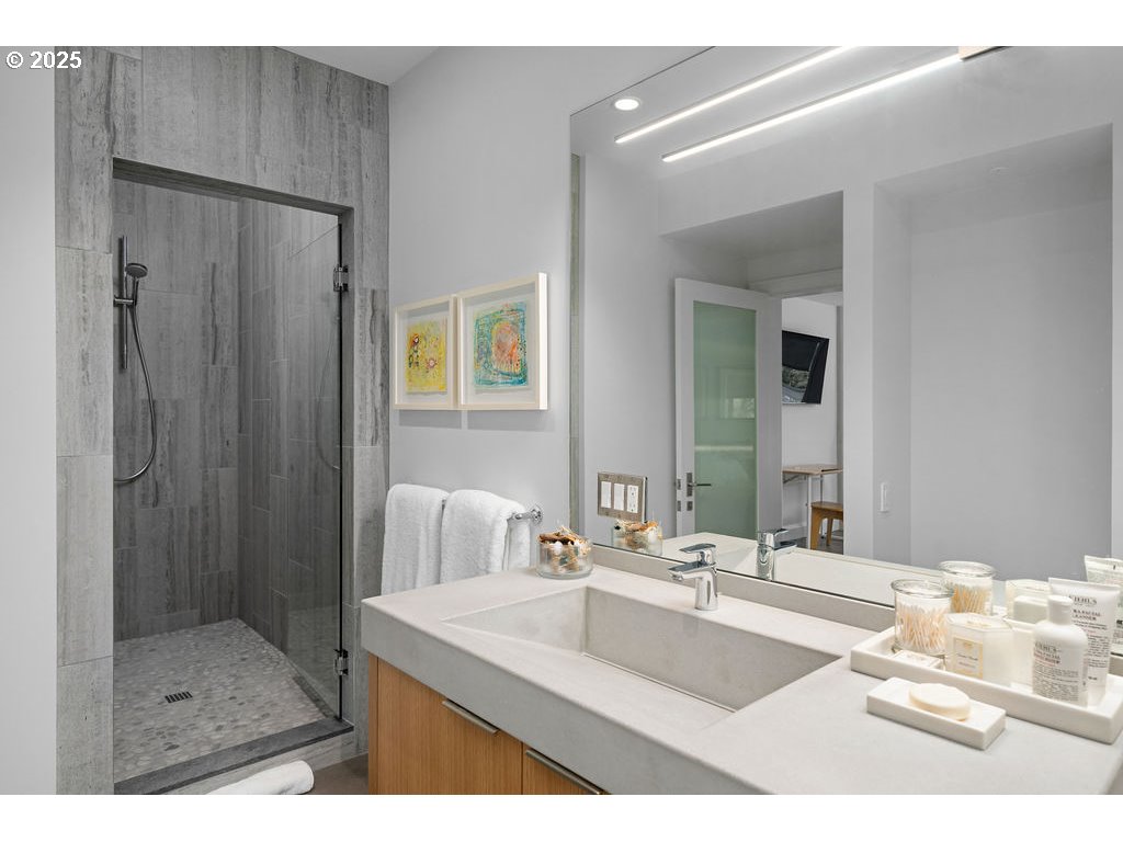 2627 Park Road Lake Oswego, OR 97034 - Photo 36 of 47 a bathroom with a sink and a mirror
